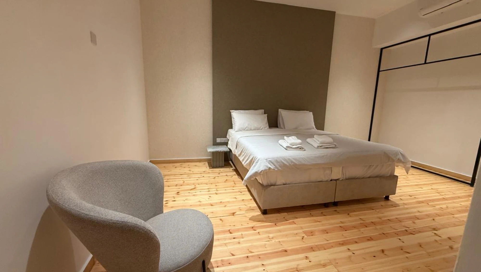 elegant room in Larnaca near Finikoudes Beach with double bed and minimal style